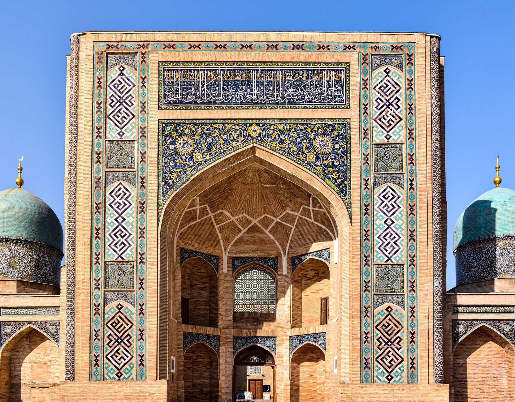 Showcasing the intricate facade of the Barakhan Madrasah in Tashkent, Uzbekistan · Karakalpakstan, Uzbekistan