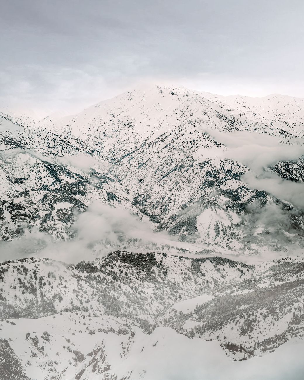 View of snow-covered mountains and clouds in Tashkent Region, Uzbekistan · Marguzor — Fann Mountains, Tajikistan, Uzbekistan