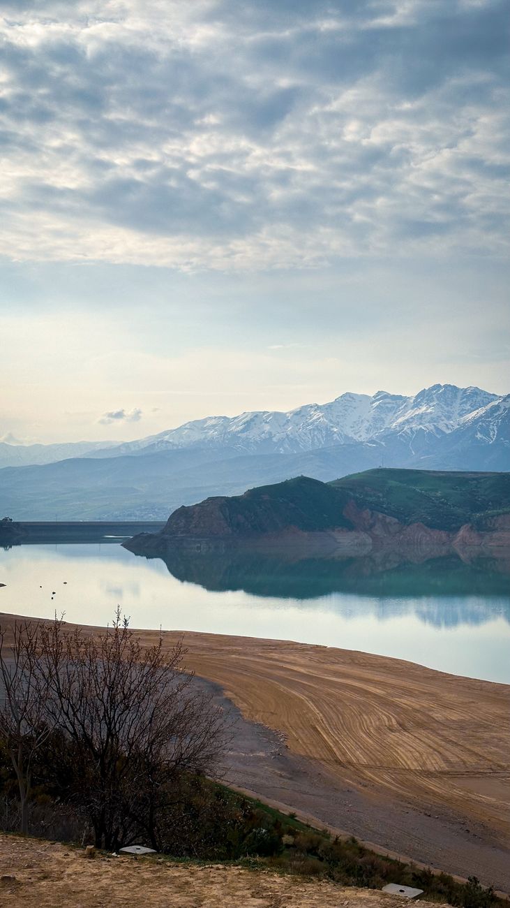 Peaceful lake with mountains in Uzbekistan, perfect for nature lovers · Nurata & Aydarkul, Uzbekistan