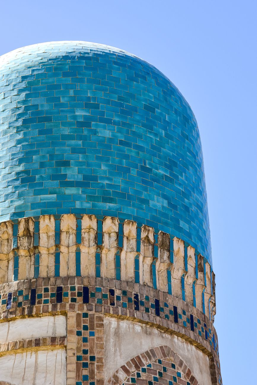 Shot of a blue-tiled minaret from the Chor Minor Madrasa in Bukhara, Uzbekistan · Shakhrisabz, Uzbekistan