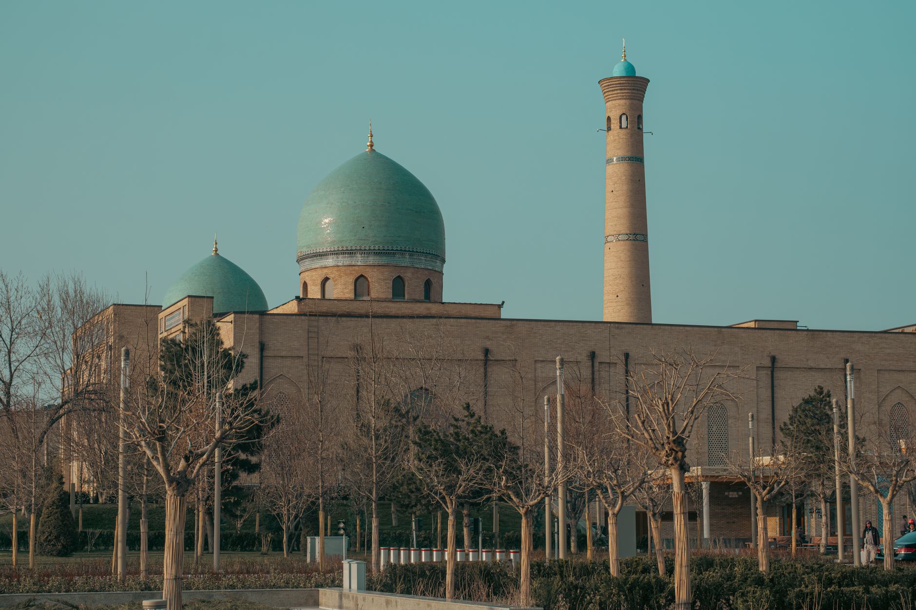 Historic mosque with iconic blue domes and a towering minaret in Tashkent, Uzbekistan · People & culture, Uzbekistan