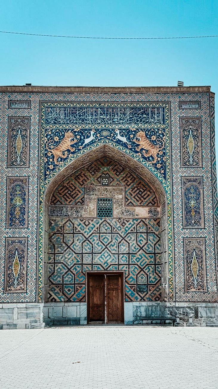 Rich designs of Islamic architecture at a historic site in Uzbekistan with stunning mosaic details