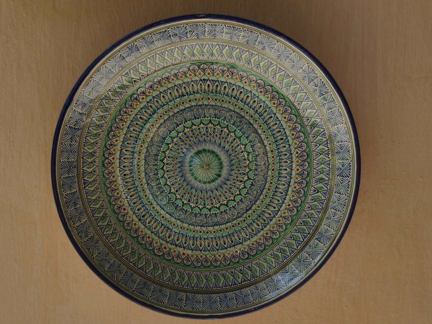 Blue and turquoise Rishton ceramics on display in the Fergana Valley